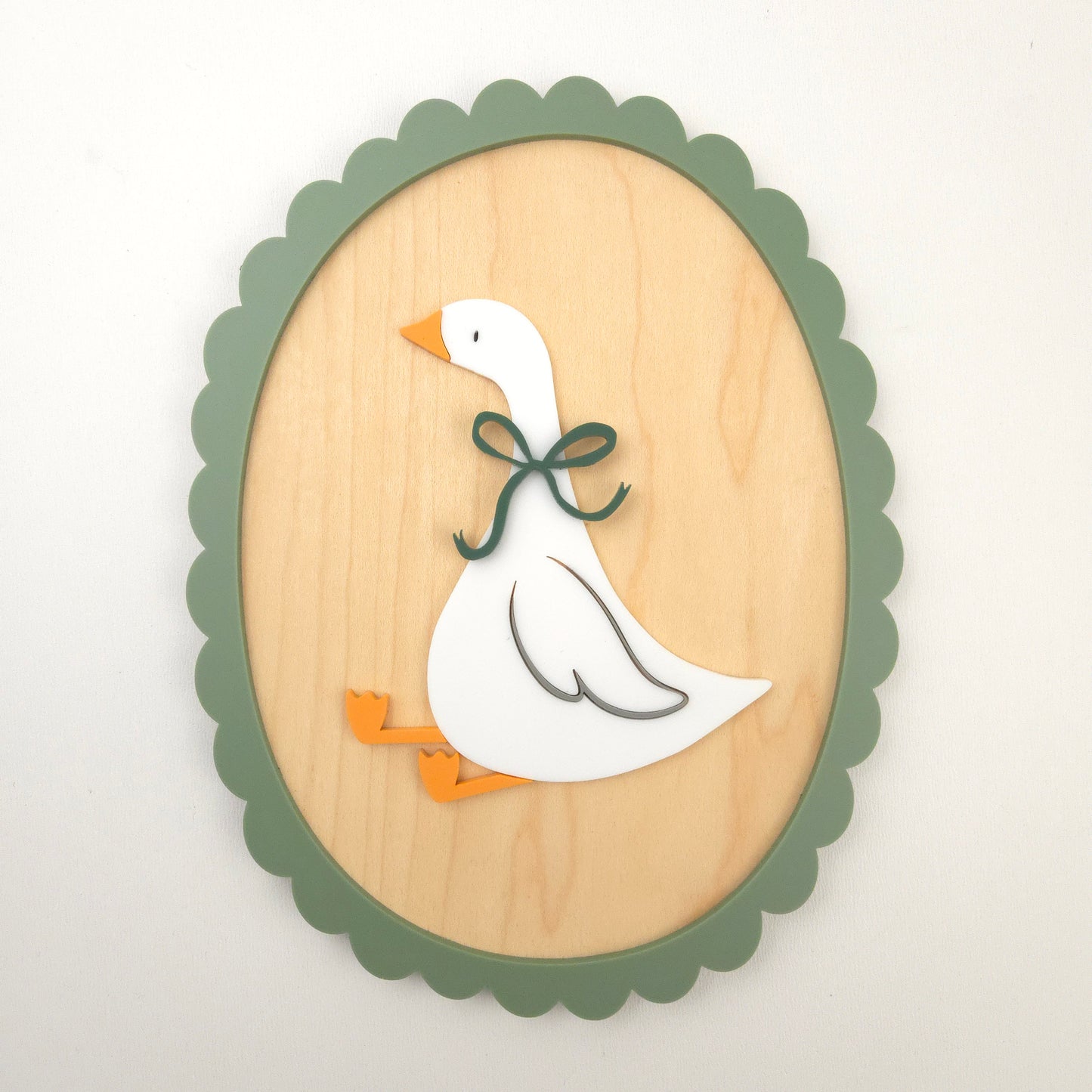 Sitting Goose with Scalloped Frame