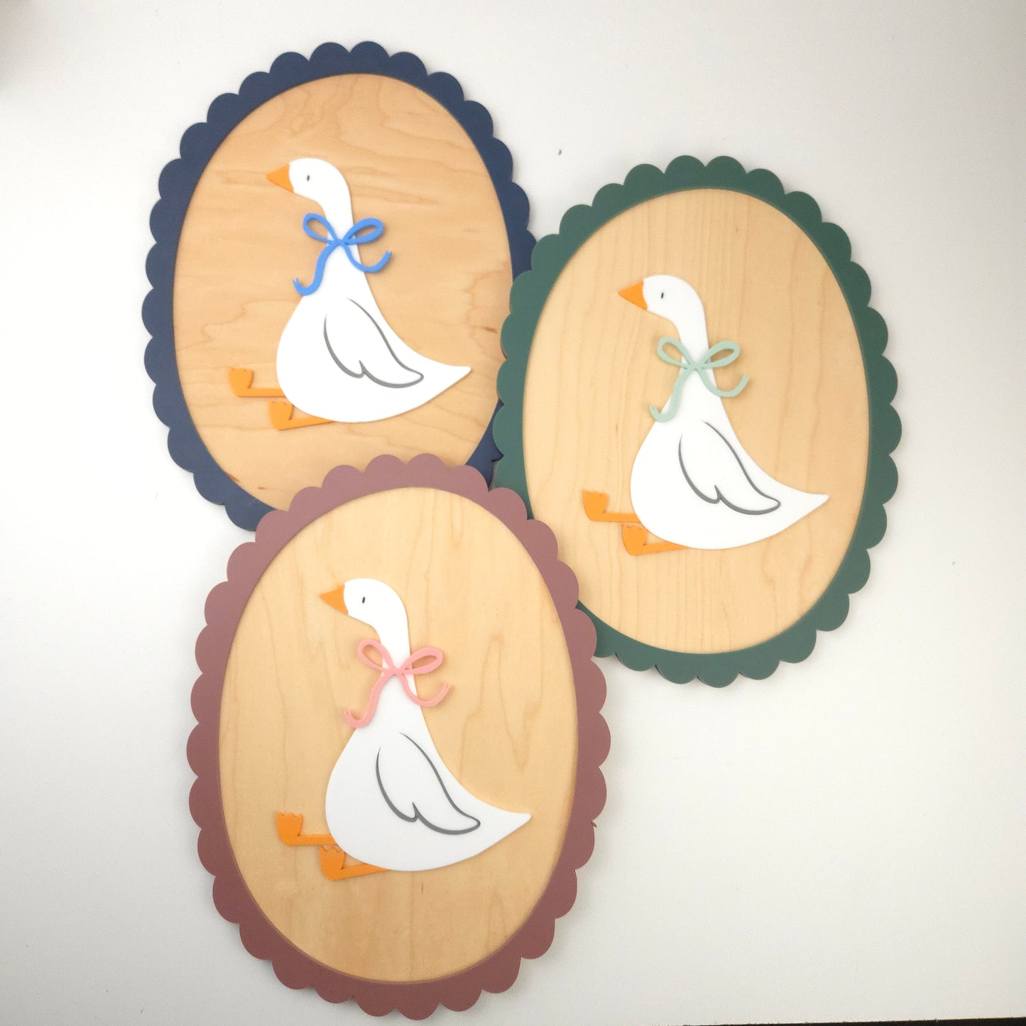Sitting Goose with Scalloped Frame